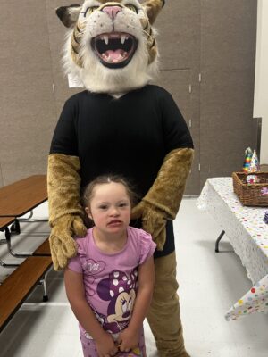 Welby elementary student and mascot.